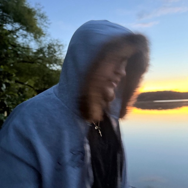 Mike by the water at sunset